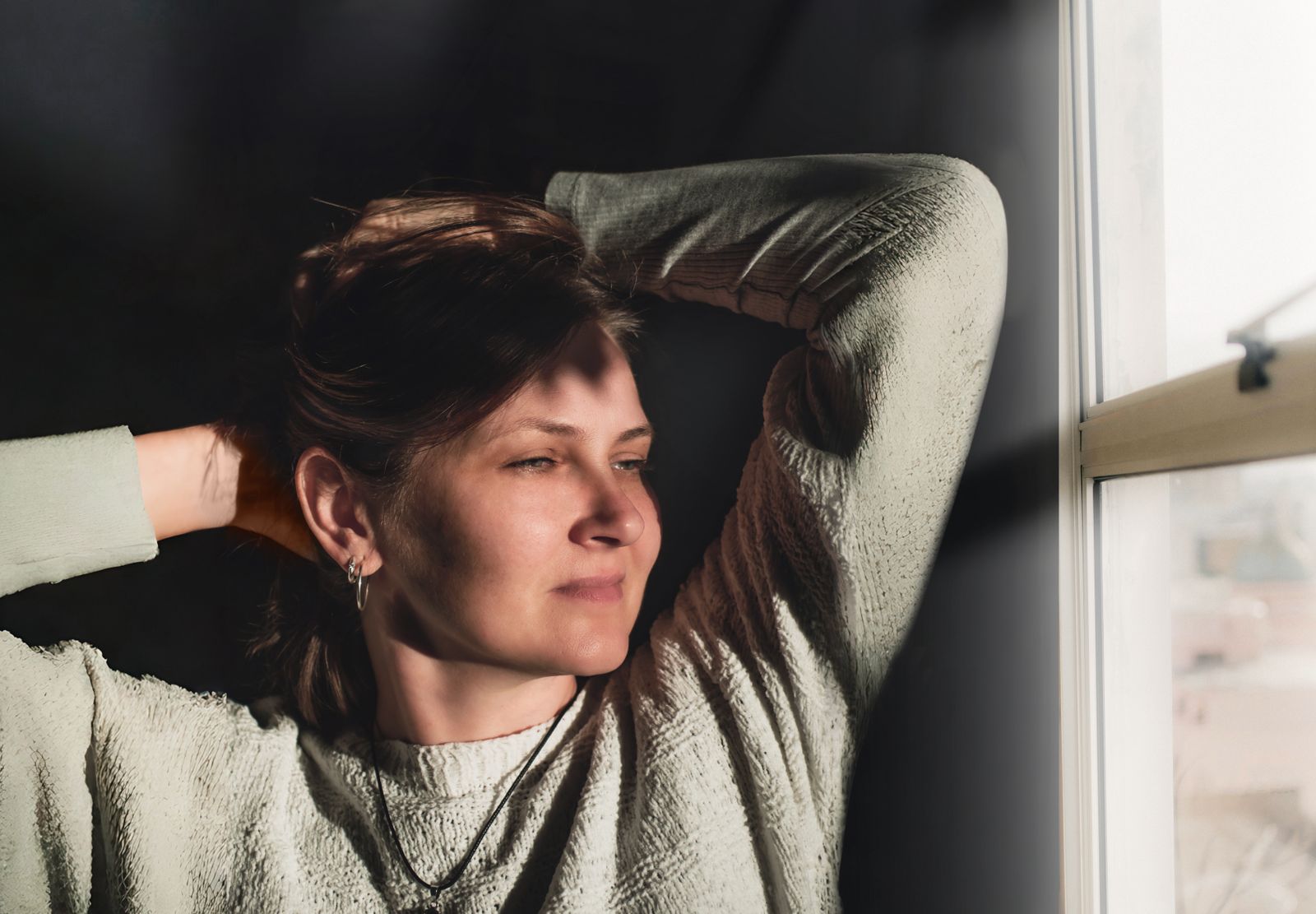 Woman stretching, relieved of hormone symptoms