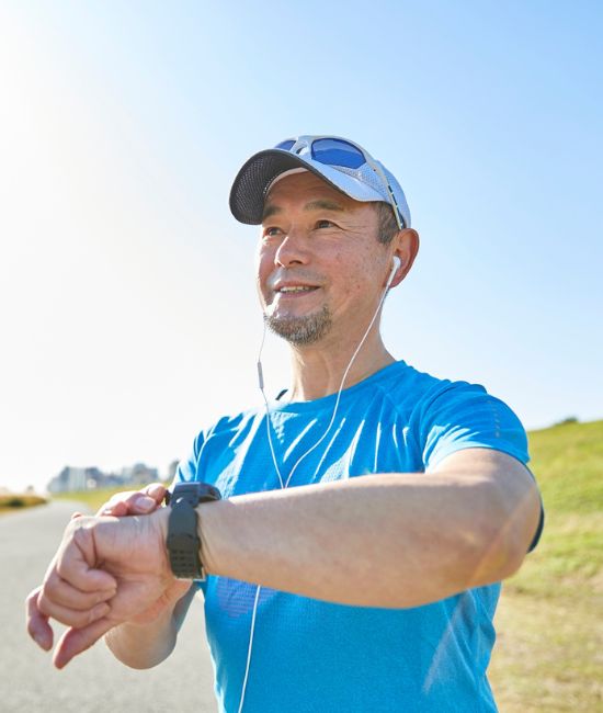 Mature man running outdoors