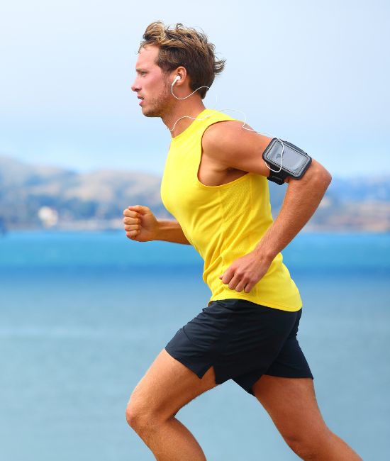 Mature man running outdoors